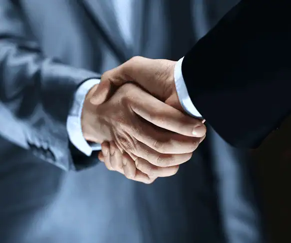 Handshake image representing partnership or agreement
